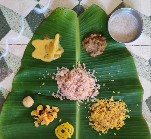 The image shows a vegetarian Goan preparation of poha