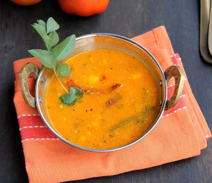 The image shows Goan tomato curry called saar