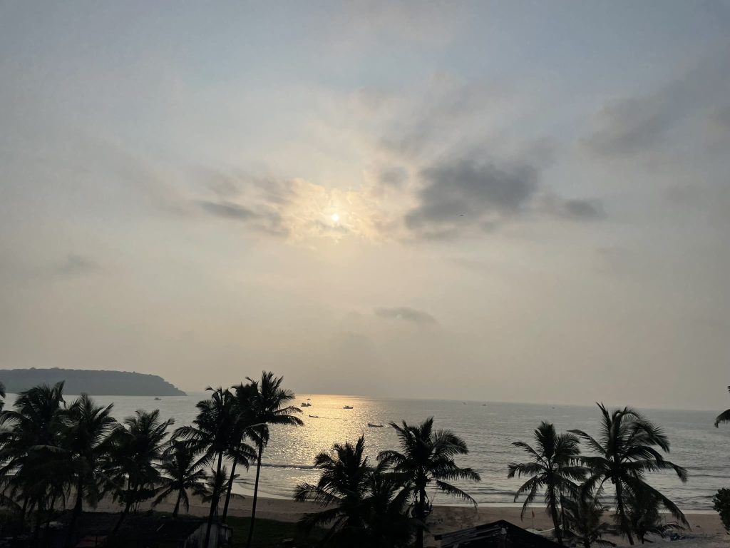 The image shows the best sunset in Goa at Baina Beach in South Goa